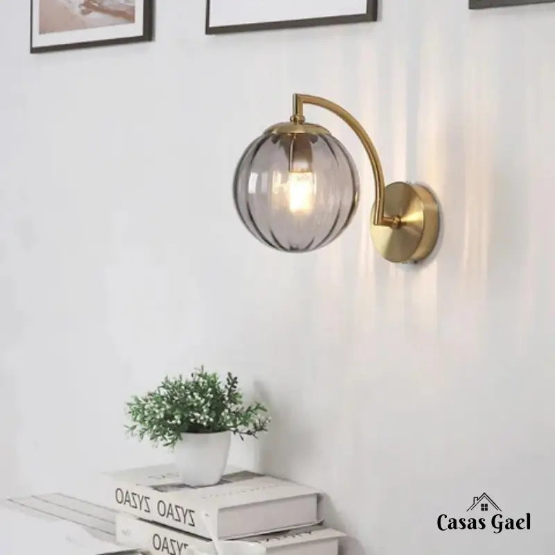 Gold Wall Sconce in Metal and Glass