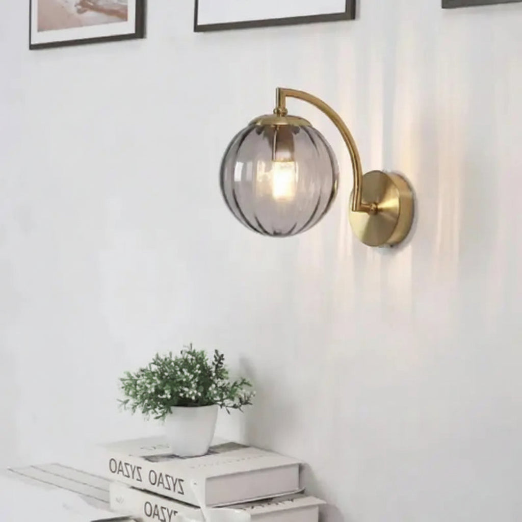 Aplique de pared dorado en metal y cristal